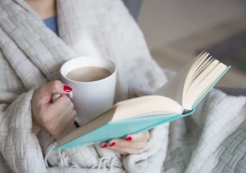 lady reading a book to treat insomnia