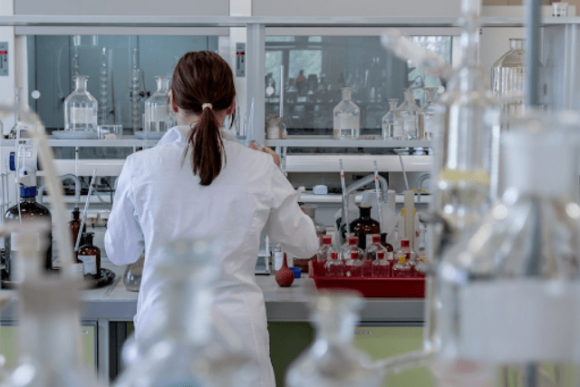 a lab tech drug testing HHC gummies specimen